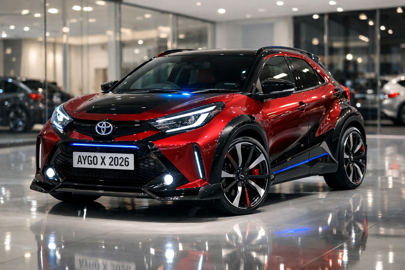 Carro Toyota Aygo X 2026 vermelho e preto em salão moderno com luzes brilhantes.
